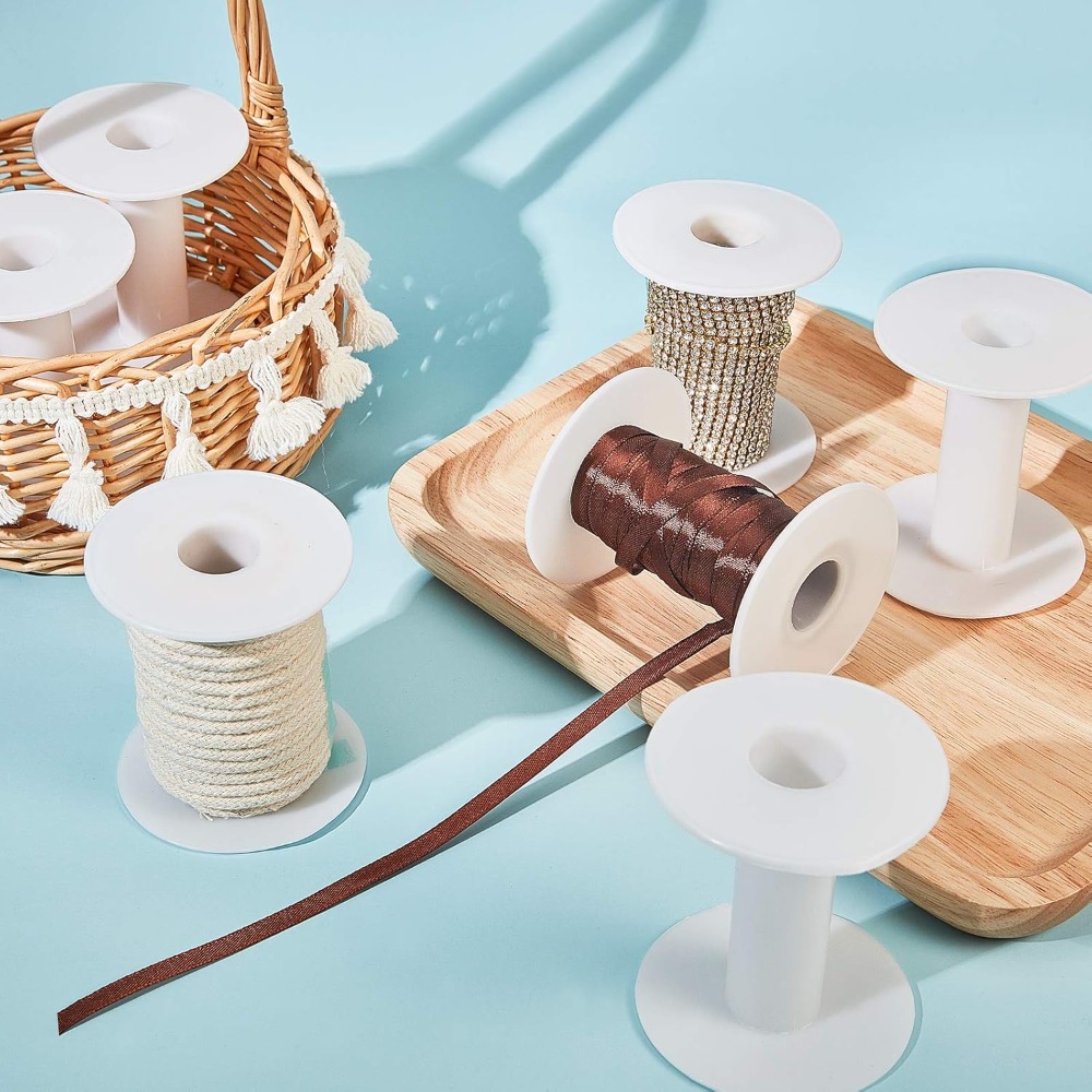 Carretes vacíos de plástico pa - Thread Bobbins Empty reseña y precio